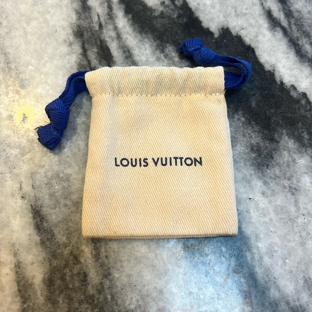 Tiny Louis Vuitton jewelry bag